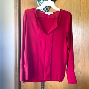 Burgundy red long sleeve lightweight blouse.
